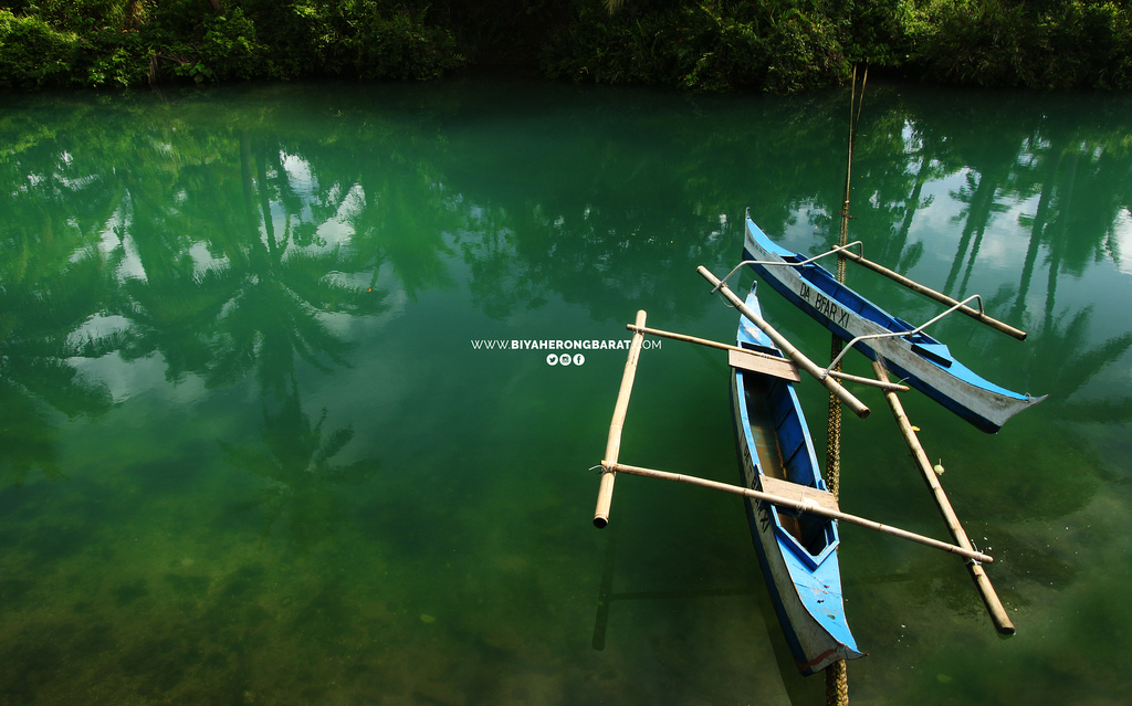Carolina Lake Baganga Davao Oriental BFAR boats green water
